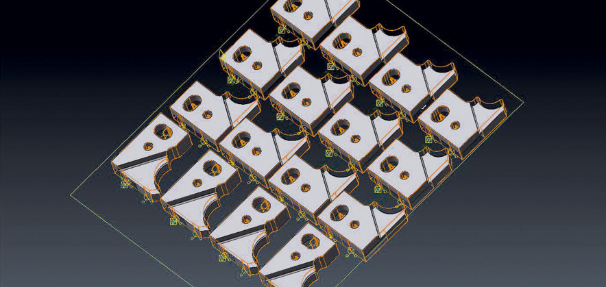 3D-CAD-Zeichnung der Platte eines Stanzwerkzeuges (die erodierten Schnitte sind mit orangefarbenen Linien gekennzeichnet).