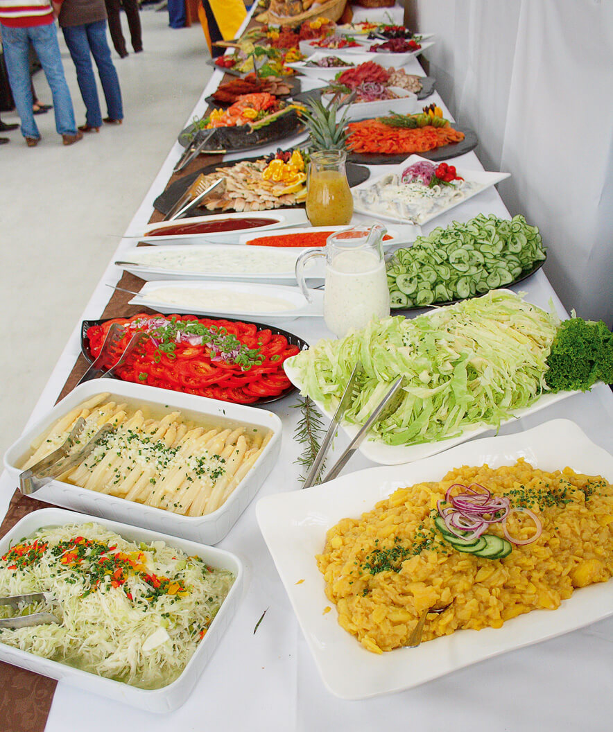 The guests of the anniversary celebration looked forward to an opulent buffet of hot and cold dishes.