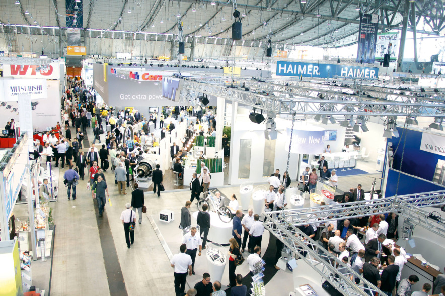 View inside a busy exhibition centre hall.