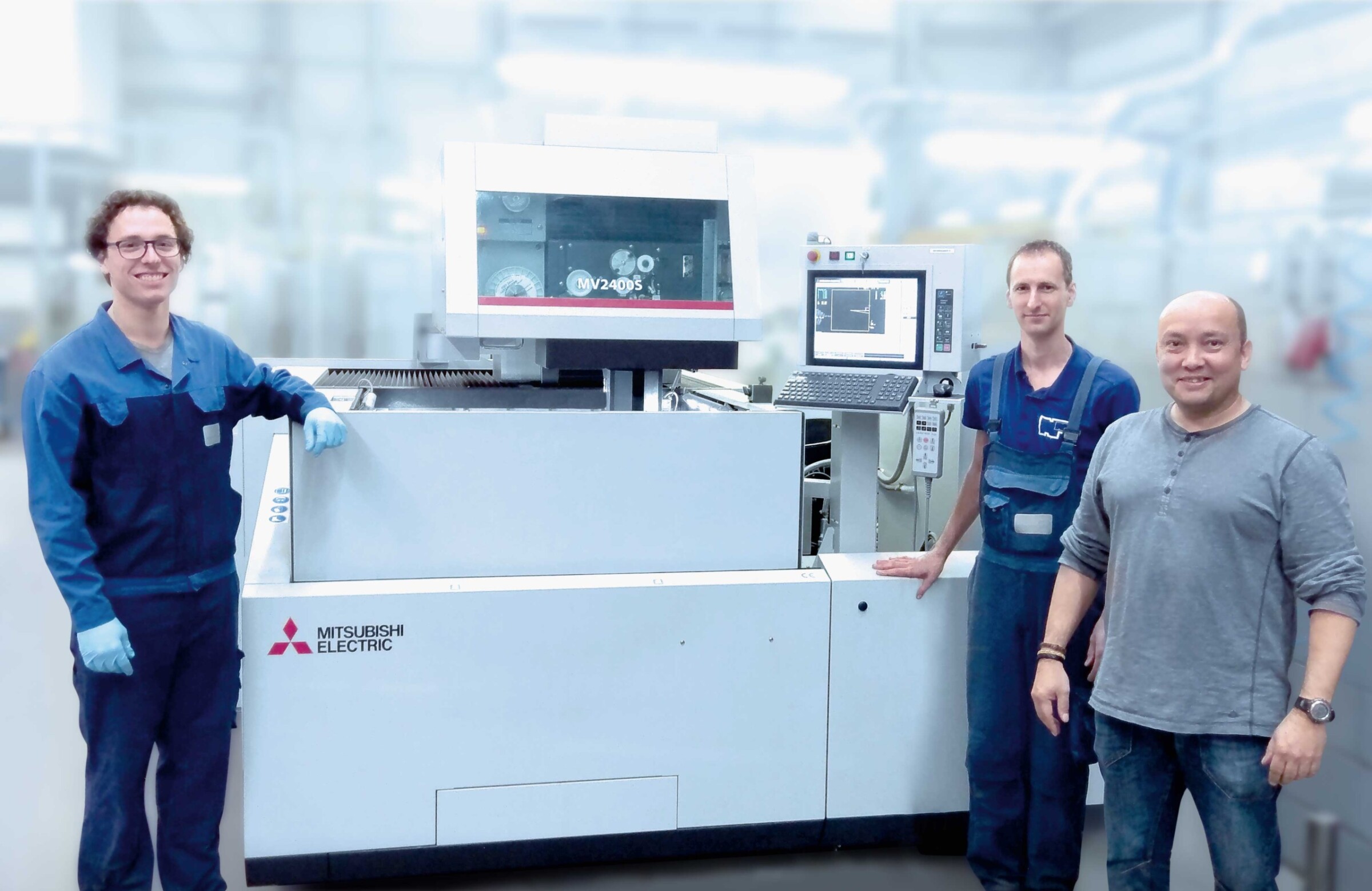 A proud team – in good spirits thanks to reliable EDM technology.