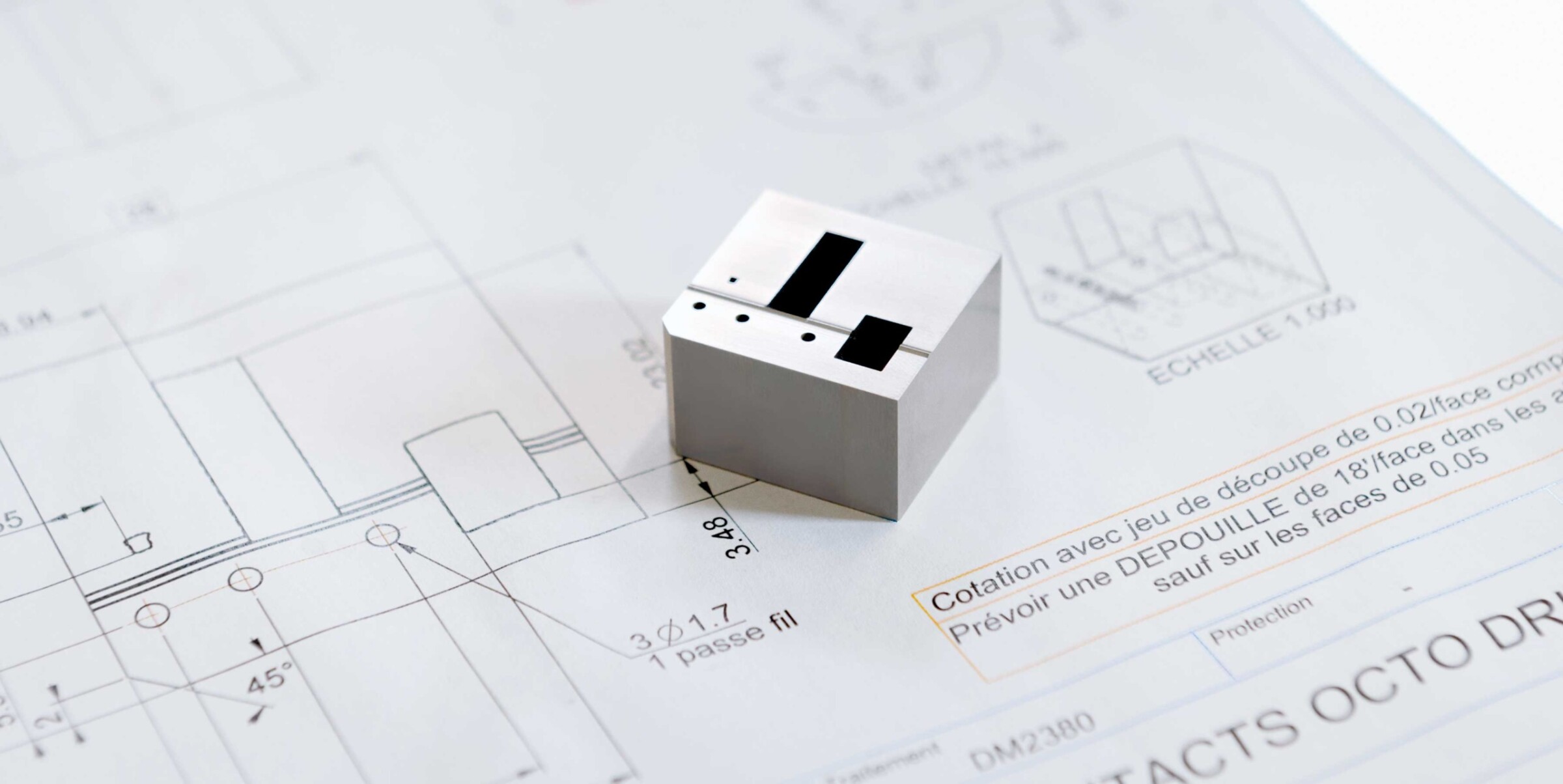 Small components are nested for unmanned wire-cutting in cost-effective series production.