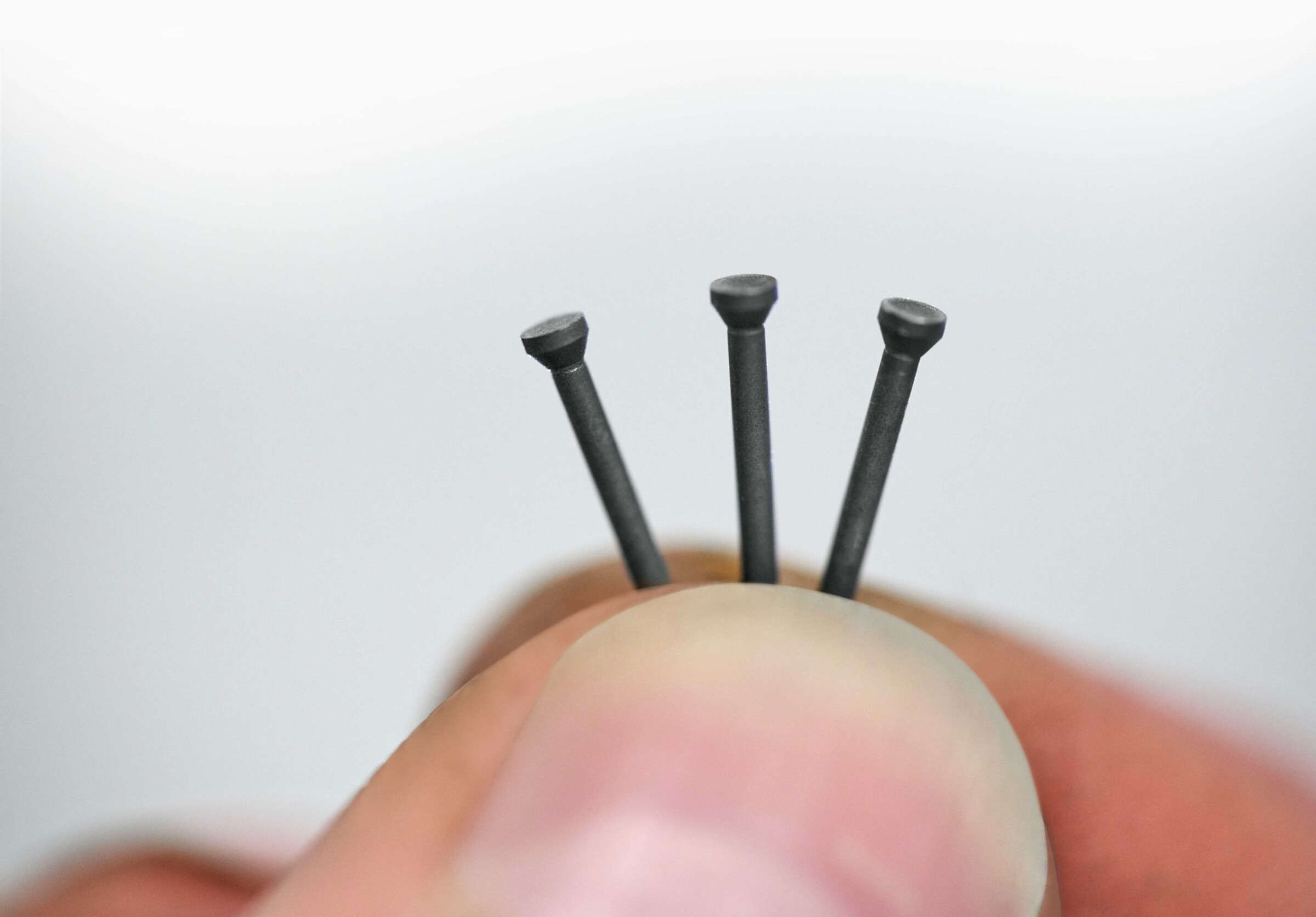 Ejector pins for injection moulds produced with 3 µm precision.