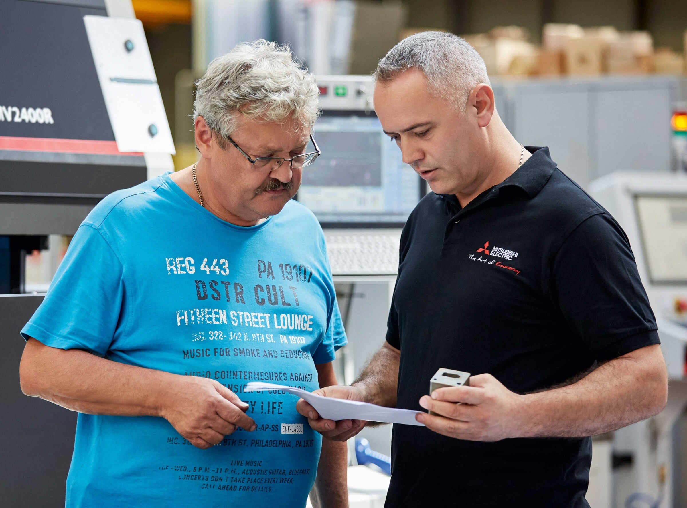 Peter Just (left), machine operator, and Mursel Jahaj, head of tool-making at Springfix Befestigungselemente GmbH in Salach