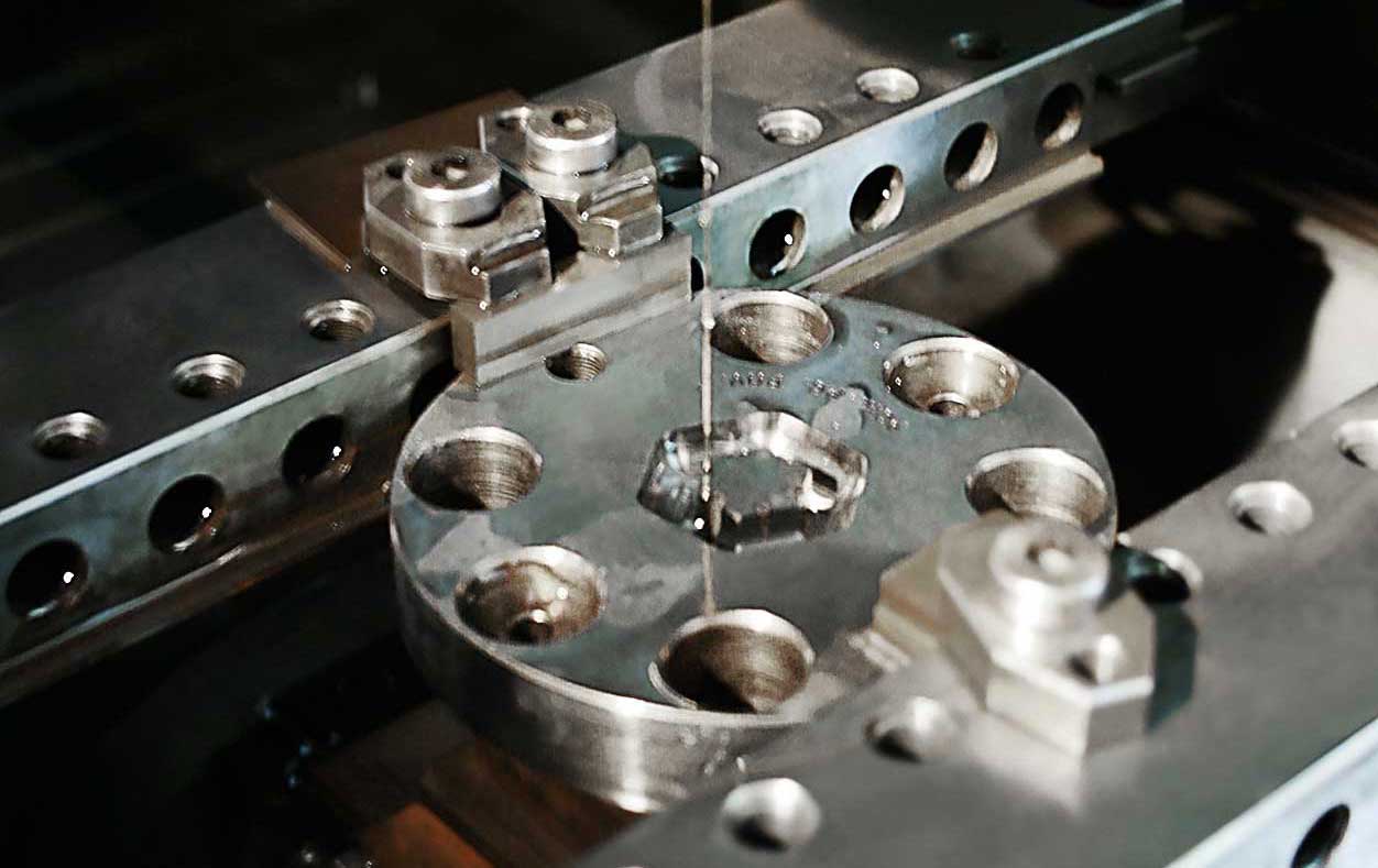 A small tool being machined on the PA20. Here again the workpiece (bottom) is carried by a special holder.