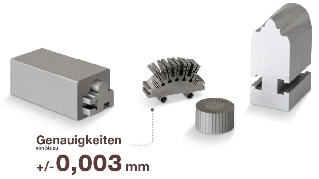 Bauteile aus Stahl, teils mit 0,1-­mm-­Dünndraht bearbeitet und Aluminium­-Bauteil mit komplexer 3D­-Kontur